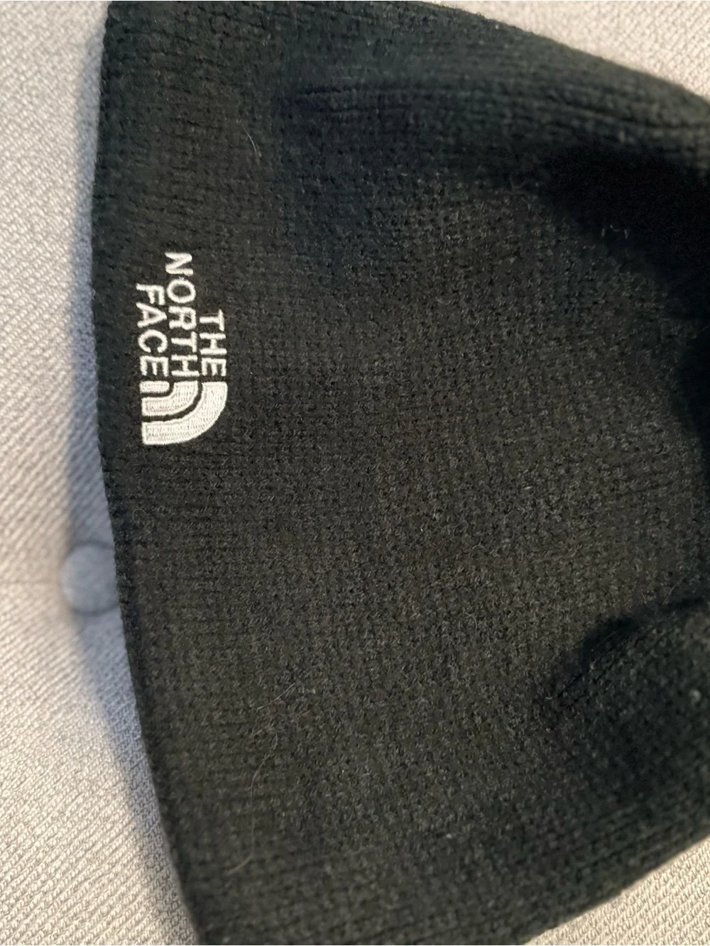 The North Face Black Beanie with White Logo